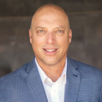 Portrait of James P. Delgado, Associate Broker